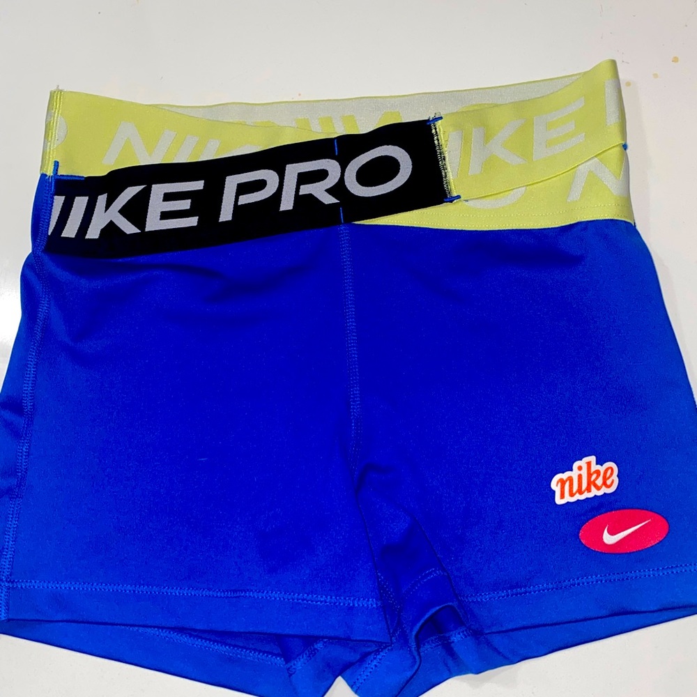 Nike Pro Blue Athletic Shorts with Yellow Waistband